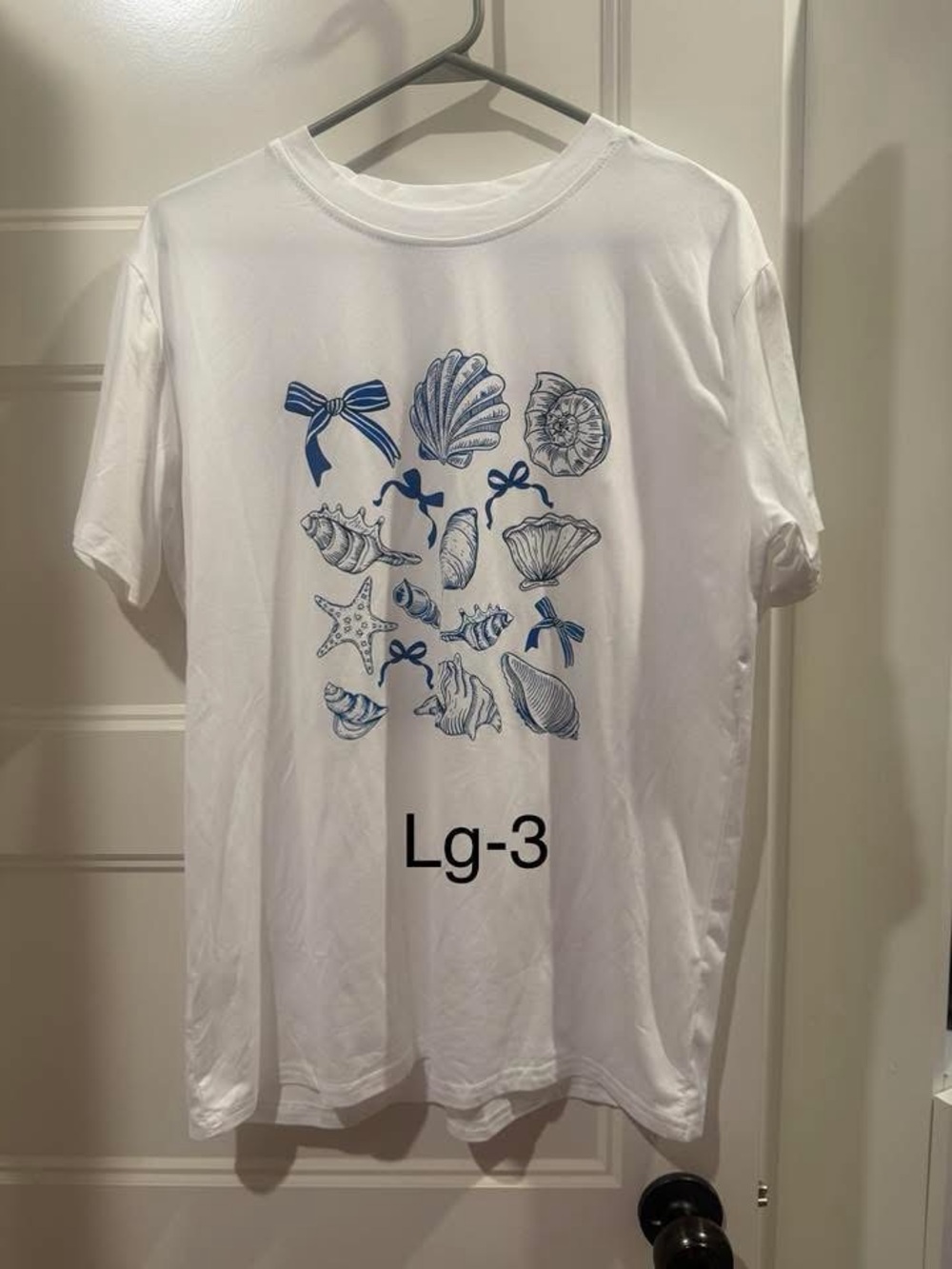 White Short Sleeve Tee with Blue Shell Motif